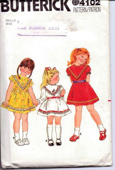 Butterick 4102 Girls Top Stitched Party School Dress Pull Over Short Sleeves Vintage 1980's Sewing Pattern - VintageStitching - Vintage Sewing Patterns