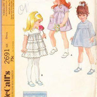 McCall's 2691 Vintage Pattern Toddler Smocked Dress Ruffled Eyelet - VintageStitching - Vintage Sewing Patterns